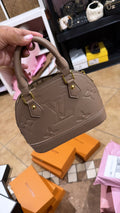 LV Alma bag